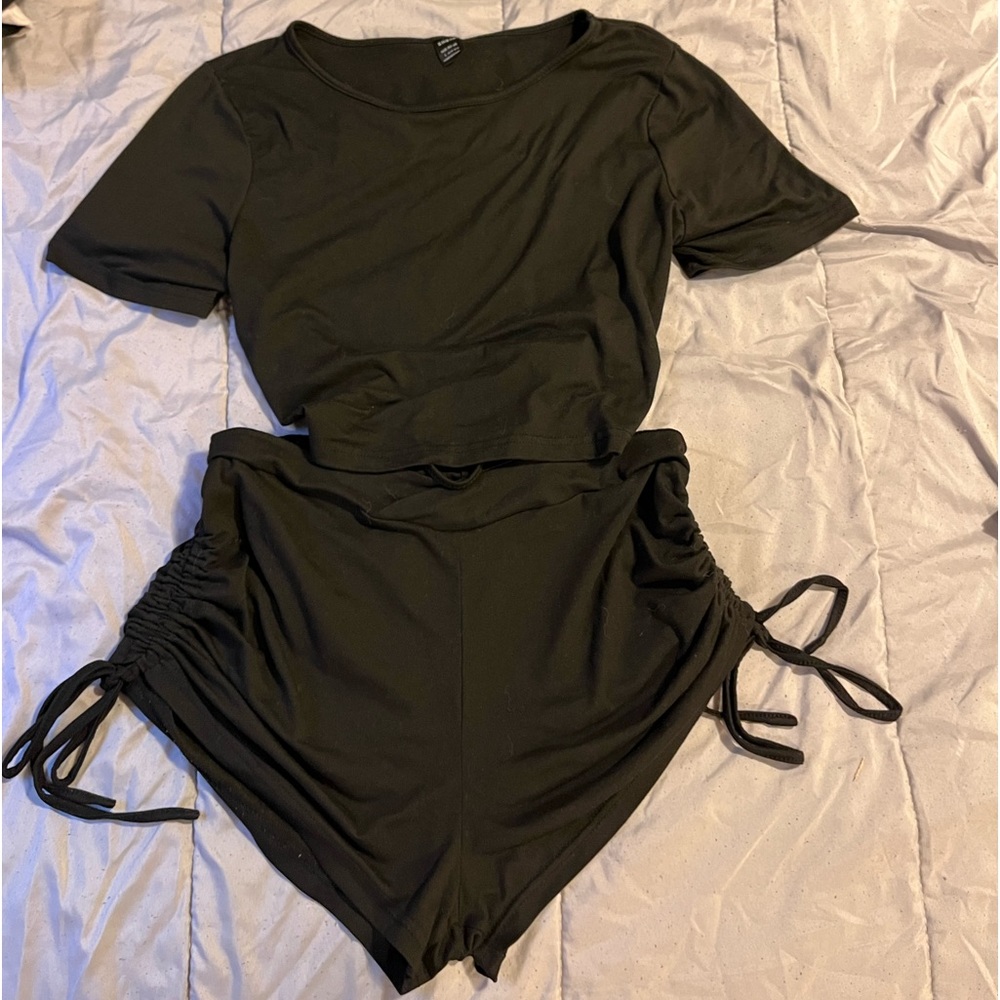 Black outfit, cute cut on the back of the crop top. Shein size large